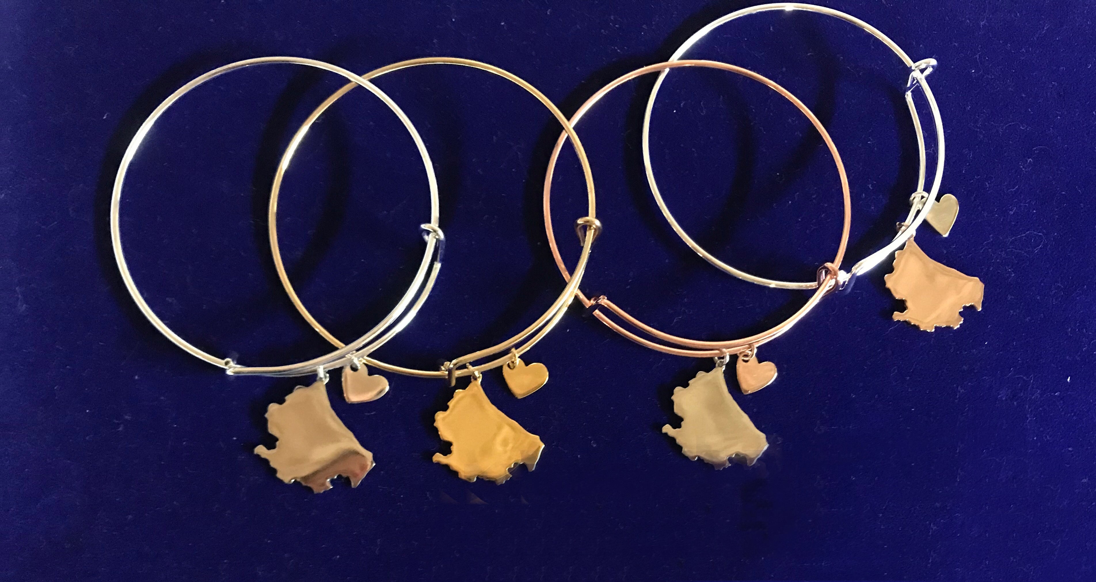 Bracciali in acciaio rigido scorrevole con ciondoli in argento